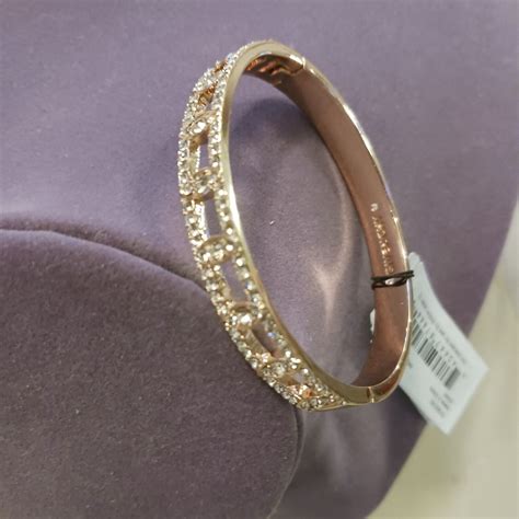 givenchy rose goldtone rhinestone hinged bangle|Givenchy necklace.